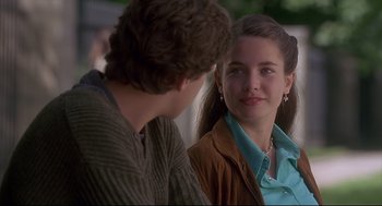 Movie still from “D3: The Mighty Ducks” (1996), directed by Robert Lieberman – A man and a woman talking to each other; Close Up shot, Over the shoulder angle