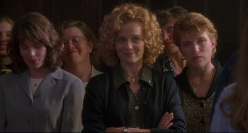 Movie still from “D3: The Mighty Ducks” (1996), directed by Robert Lieberman – A group of women standing next to each other in a room; Medium shot, Low angle