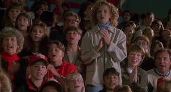 Movie still from “D3: The Mighty Ducks” (1996), directed by Robert Lieberman – A group of people standing in front of each other; Medium shot, Low angle