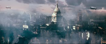 Movie still from “Dad's Army” (2016), directed by Oliver Parker – An aerial view of a city with a dome in the middle of it; Extreme Wide shot, High angle