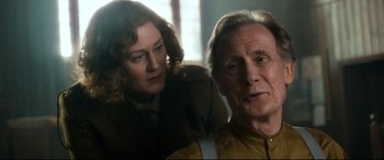 Movie still from “Dad's Army” (2016), directed by Oliver Parker – A man and a woman looking at each other; Close Up shot, Over the shoulder angle