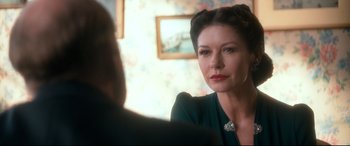 Movie still from “Dad's Army” (2016), directed by Oliver Parker – A person sitting in front of a mirror; Close Up shot, Over the shoulder angle