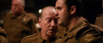 Movie still from “Dad's Army” (2016), directed by Oliver Parker – Two men in military uniforms looking at each other; Close Up shot, Over the shoulder angle