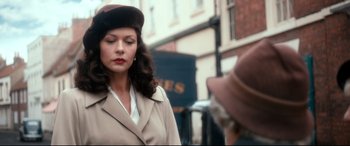 Movie still from “Dad's Army” (2016), directed by Oliver Parker – A woman wearing a coat and a fur hat; Close Up shot, Low angle