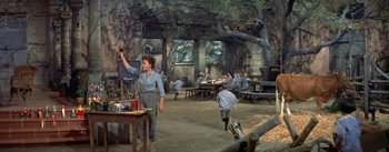 Movie still from “Daddy Long Legs” (1955), directed by Jean Negulesco – A group of children playing a game in a field; Wide shot, High angle