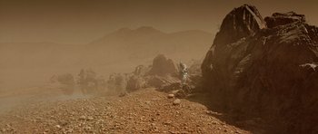 Movie still from “The Hills Have Eyes” (2006), directed by Alexandre Aja – An image of an astronaut on the surface of mars; Extreme Wide shot, High angle
