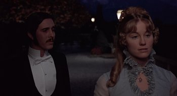 Movie still from “Daisy Miller” (1974), directed by Peter Bogdanovich – A man and a woman dressed in period clothing; Medium shot, Over the shoulder angle