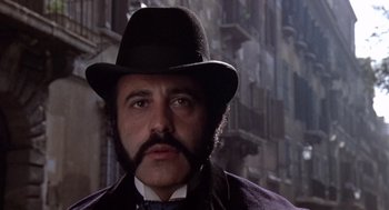 Movie still from “Daisy Miller” (1974), directed by Peter Bogdanovich – A person wearing a hat; Close Up shot, Low angle