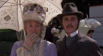 Movie still from “Daisy Miller” (1974), directed by Peter Bogdanovich – A man and a woman dressed in period clothing; Close Up shot, Low angle