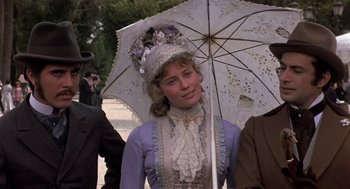 Movie still from “Daisy Miller” (1974), directed by Peter Bogdanovich – A woman in a victorian dress holding an umbrella; Close Up shot, Over the shoulder angle