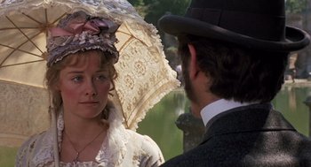 Movie still from “Daisy Miller” (1974), directed by Peter Bogdanovich – A man and a woman dressed in period clothing; Close Up shot, Over the shoulder angle