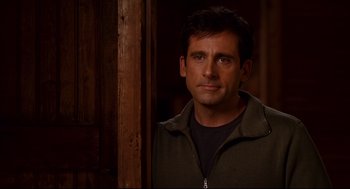 Movie still from “Dan in Real Life” (2007), directed by Peter Hedges – A person standing in a room; Medium shot, Over the shoulder angle