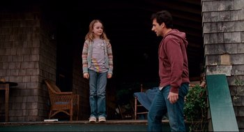 Movie still from “Dan in Real Life” (2007), directed by Peter Hedges – A man and a little girl standing on a porch; Wide shot, Low angle