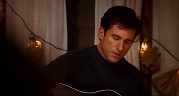 Movie still from “Dan in Real Life” (2007), directed by Peter Hedges – A person with a guitar; Close Up shot, Over the shoulder angle