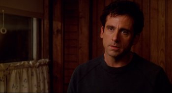 Movie still from “Dan in Real Life” (2007), directed by Peter Hedges – A person in a room; Close Up shot, Over the shoulder angle