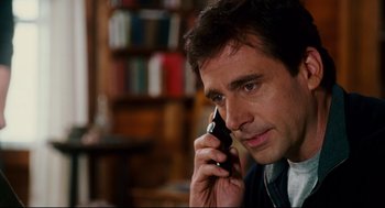 Movie still from “Dan in Real Life” (2007), directed by Peter Hedges – A person talking on a cell phone; Close Up shot, Over the shoulder angle