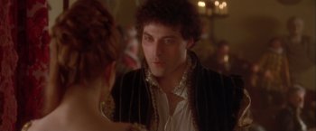 Movie still from “Dangerous Beauty” (1998), directed by Marshall Herskovitz – A man and a woman are talking to each other; Close Up shot, Over the shoulder angle