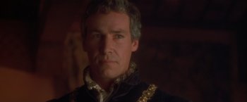 Movie still from “Dangerous Beauty” (1998), directed by Marshall Herskovitz – A person wearing a jacket; Close Up shot, Over the shoulder angle