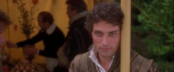 Movie still from “Dangerous Beauty” (1998), directed by Marshall Herskovitz – A person wearing a jacket; Close Up shot, Over the shoulder angle