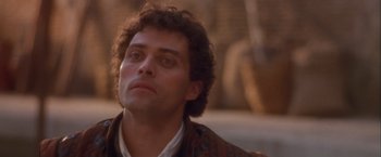 Movie still from “Dangerous Beauty” (1998), directed by Marshall Herskovitz – A person wearing a jacket; Close Up shot, Low angle