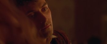 Movie still from “Dangerous Beauty” (1998), directed by Marshall Herskovitz – A man's face in a dark room; Close Up shot, Low angle