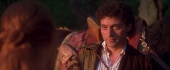 Movie still from “Dangerous Beauty” (1998), directed by Marshall Herskovitz – A person with a horse; Close Up shot, Over the shoulder angle