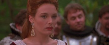 Movie still from “Dangerous Beauty” (1998), directed by Marshall Herskovitz – A person wearing a white dress; Close Up shot, Over the shoulder angle