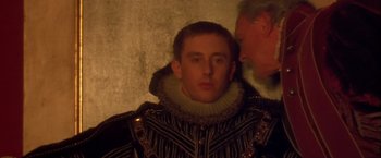 Movie still from “Dangerous Beauty” (1998), directed by Marshall Herskovitz – A man wearing a suit of armor with a man wearing a suit of armor; Close Up shot, Over the shoulder angle