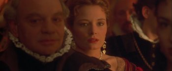 Movie still from “Dangerous Beauty” (1998), directed by Marshall Herskovitz – A person wearing a dress; Close Up shot, Over the shoulder angle