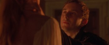 Movie still from “Dangerous Beauty” (1998), directed by Marshall Herskovitz – A person looking at something; Close Up shot, Over the shoulder angle