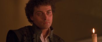 Movie still from “Dangerous Beauty” (1998), directed by Marshall Herskovitz – A person wearing a jacket; Close Up shot, Low angle