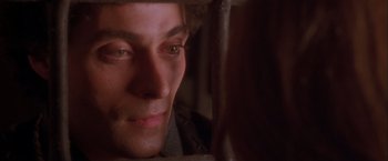 Movie still from “Dangerous Beauty” (1998), directed by Marshall Herskovitz – A man's face looking into a mirror; Close Up shot, High angle