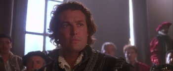 Movie still from “Dangerous Beauty” (1998), directed by Marshall Herskovitz – A person wearing a jacket; Close Up shot, Over the shoulder angle
