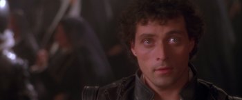 Movie still from “Dangerous Beauty” (1998), directed by Marshall Herskovitz – A person wearing a leather jacket; Close Up shot, Over the shoulder angle