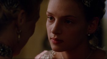 Movie still from “Dangerous Liaisons” (1988), directed by Stephen Frears – A woman's face with a man looking at her; Close Up shot, Over the shoulder angle