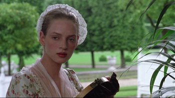 Movie still from “Dangerous Liaisons” (1988), directed by Stephen Frears – A woman in a white dress holding a guitar in a park; Close Up shot, Low angle