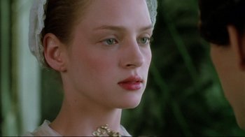 Movie still from “Dangerous Liaisons” (1988), directed by Stephen Frears – A person wearing a necklace; Close Up shot, Low angle