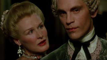 Movie still from “Dangerous Liaisons” (1988), directed by Stephen Frears – A man and a woman standing next to each other; Close Up shot, Over the shoulder angle