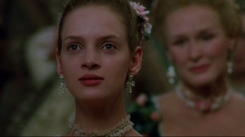 Movie still from “Dangerous Liaisons” (1988), directed by Stephen Frears – A person wearing a necklace; Close Up shot, Low angle