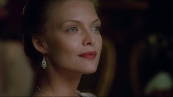 Movie still from “Dangerous Liaisons” (1988), directed by Stephen Frears – A person wearing a necklace and earring; Close Up shot, Over the shoulder angle