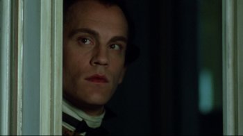 Movie still from “Dangerous Liaisons” (1988), directed by Stephen Frears – A person looking out a window; Close Up shot, Low angle
