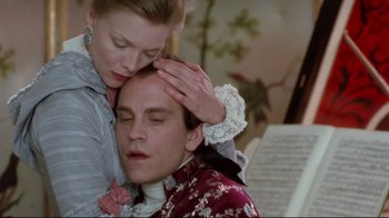 Movie still from “Dangerous Liaisons” (1988), directed by Stephen Frears – A man and a woman in period clothing; Close Up shot, Low angle