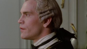 Movie still from “Dangerous Liaisons” (1988), directed by Stephen Frears – A person wearing a wig; Close Up shot, Over the shoulder angle