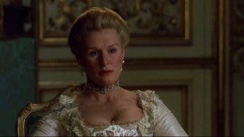 Movie still from “Dangerous Liaisons” (1988), directed by Stephen Frears – A person wearing a dress; Close Up shot, Low angle