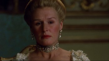 Movie still from “Dangerous Liaisons” (1988), directed by Stephen Frears – A person wearing a necklace; Close Up shot, Over the shoulder angle