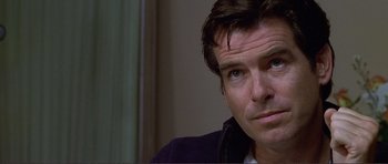 Movie still from “Dante's Peak” (1997), directed by Roger Donaldson – A person wearing a jacket; Close Up shot, Over the shoulder angle