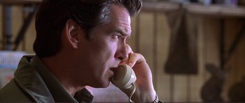 Movie still from “Dante's Peak” (1997), directed by Roger Donaldson – A person talking on a phone; Close Up shot, Low angle