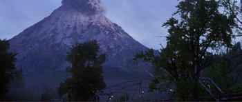 Movie still from “Dante's Peak” (1997), directed by Roger Donaldson – A view of a mountain with smoke coming from it; Extreme Wide shot, Low angle