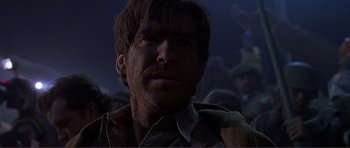 Movie still from “Dante's Peak” (1997), directed by Roger Donaldson – A person with blood all over his face; Close Up shot, Low angle