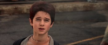 Movie still from “Daredevil” (2003), directed by Mark Steven Johnson – A young boy is looking into the distance; Close Up shot, High angle